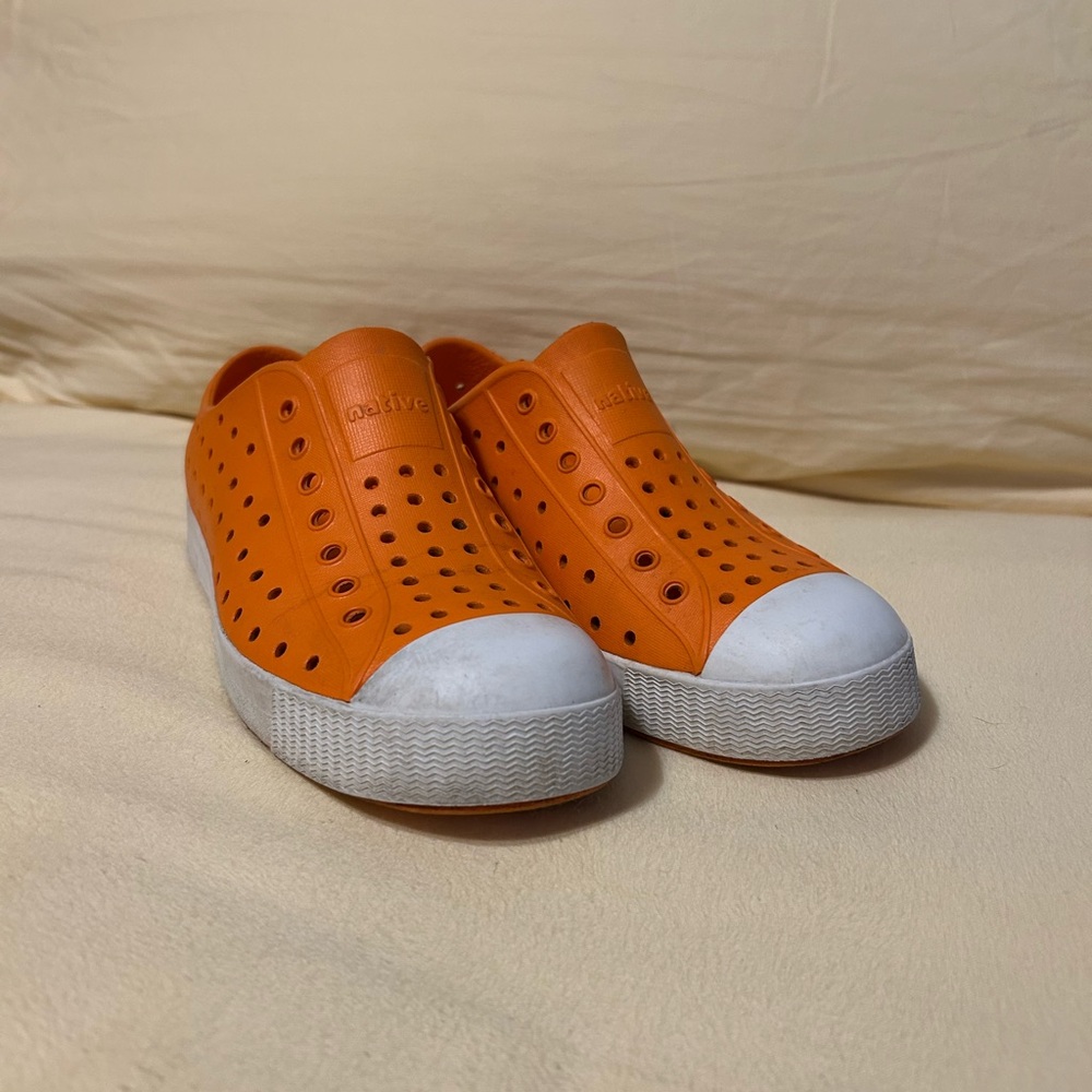 Native Orange and White Slip-On Sneakers